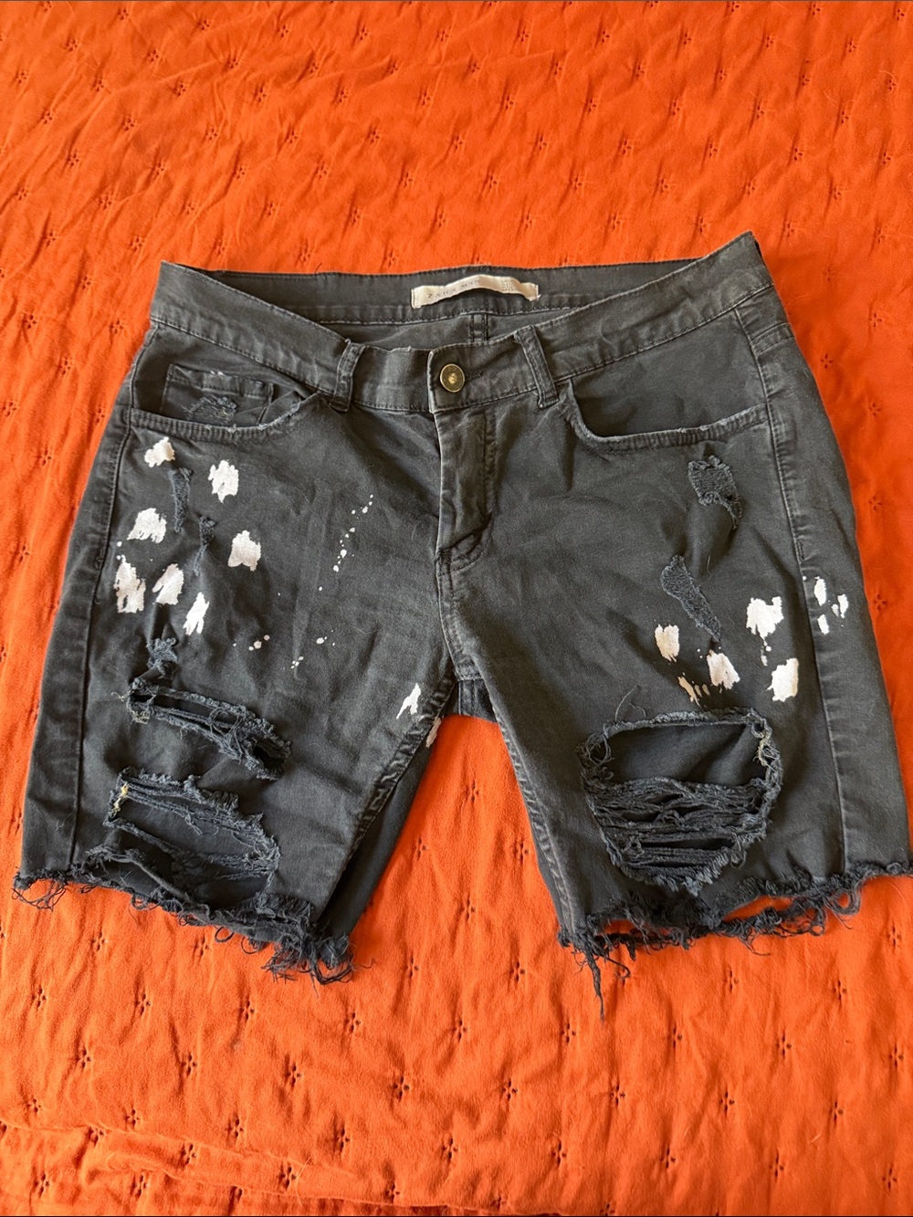 Distressed Black Paint-Splatter Denim Shorts